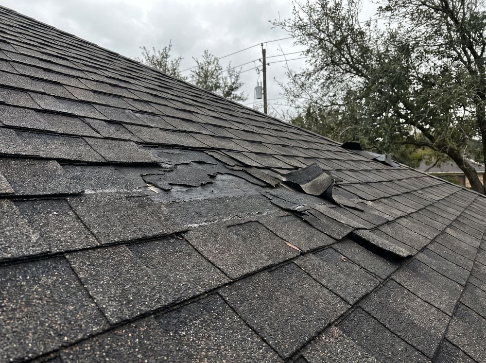 Wind-Damaged Shingle Replacement repair in Katy, TX